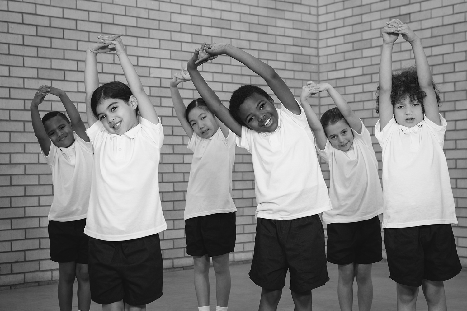 elementary school children stretching